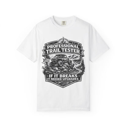White t-shirt with black graphic design featuring an off-road vehicle and text on a white background