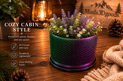 3D-printed pot with plants on a wooden surface, featuring 'Muds 3D Goods' branding.