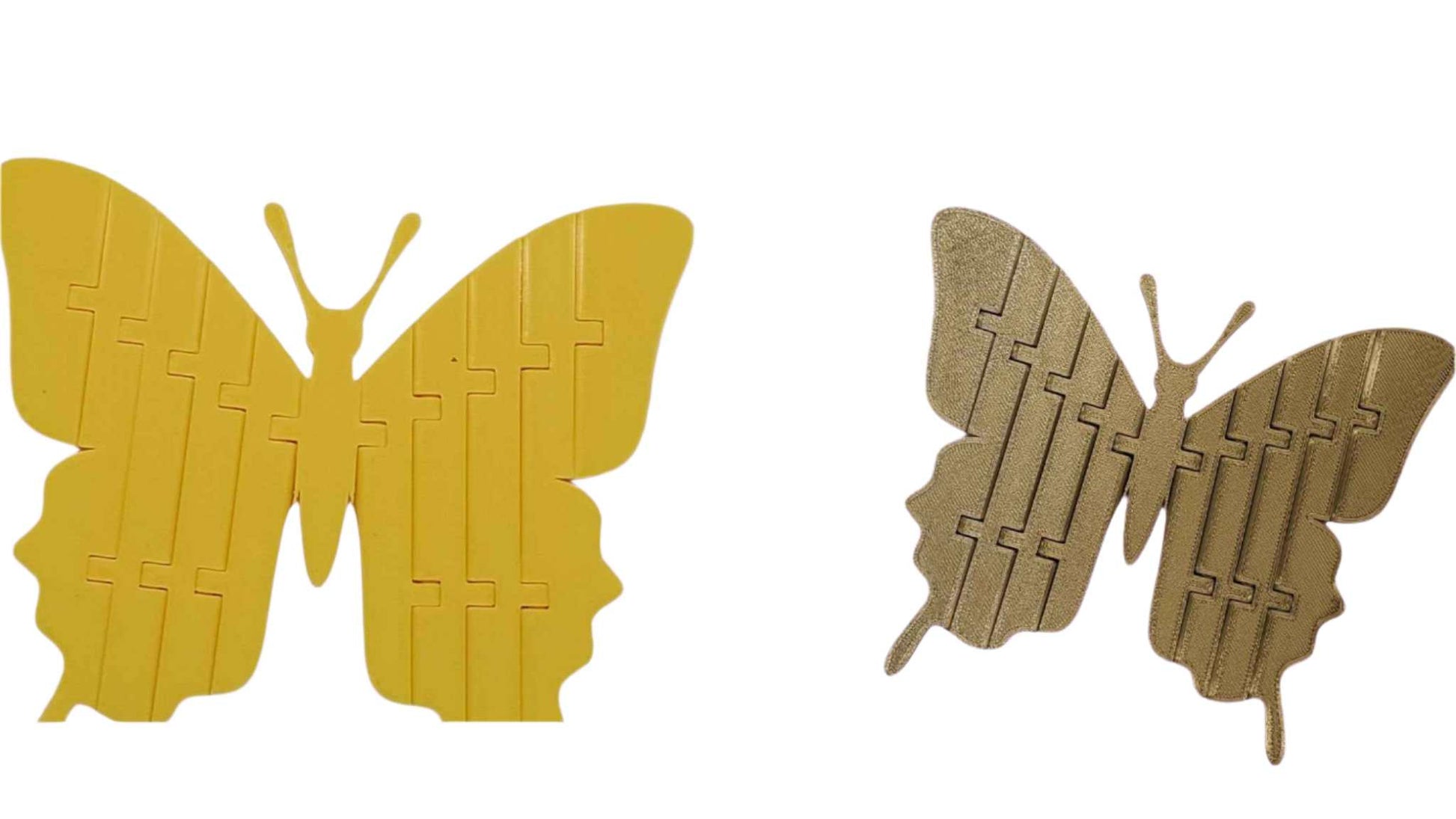 Two 3d printed butterflies on a white background